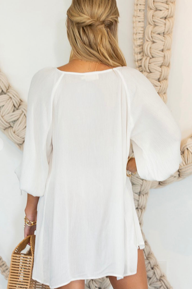 white button front tunic top or bathing suit cover-up