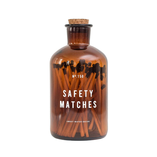 Safety| matches| in a| amber| jar|